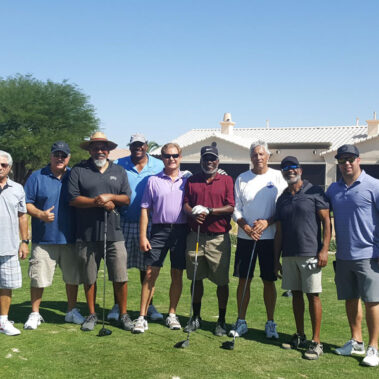 Group picture of the guys on the golf course