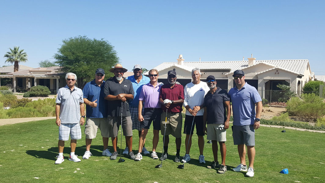 Group picture of the guys on the golf course
