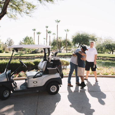 Two guys hugging each other