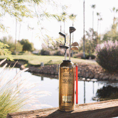 Fire extinguisher golf club holder