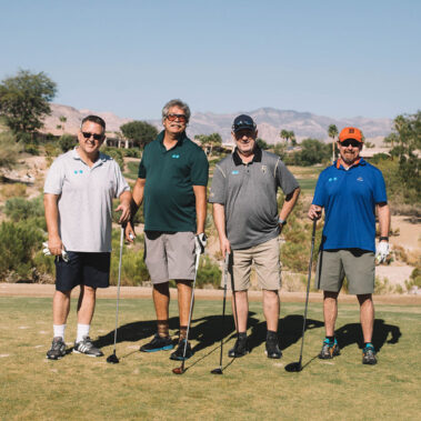 Four guys posing for a picture