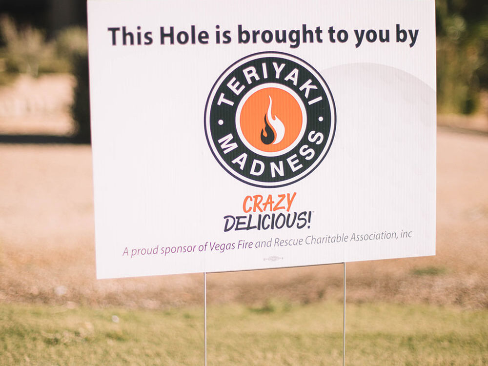 Teriyaki Madness Hole Sponor sign