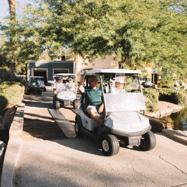 Golfers in golf carts