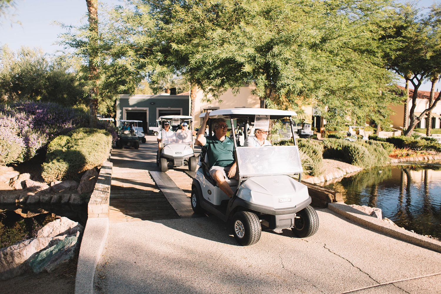 Golfers in golf carts