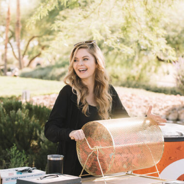 Lady turns the raffle wheel