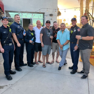 Group picture of police officers and members of the Vegas Fire and Rescue