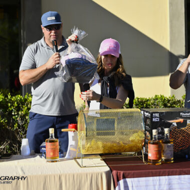 Jeff Halverson and lady doing the raffle.