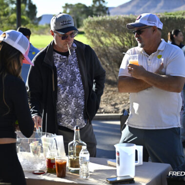 Golfers purchasing liqueur.
