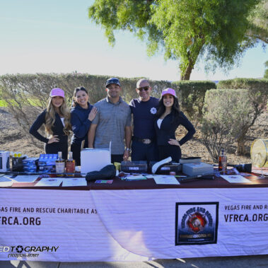 Volunteers posing for a picture at the VFRCA table.
