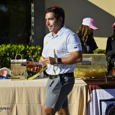 Male golfer raffle winner.