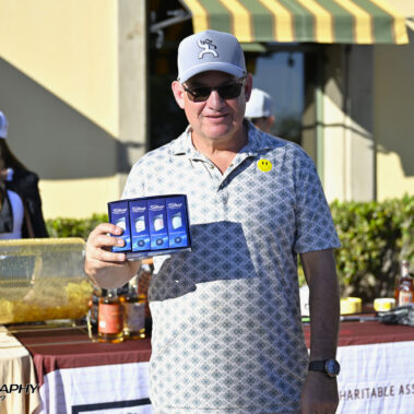 Male golfer raffle winner.